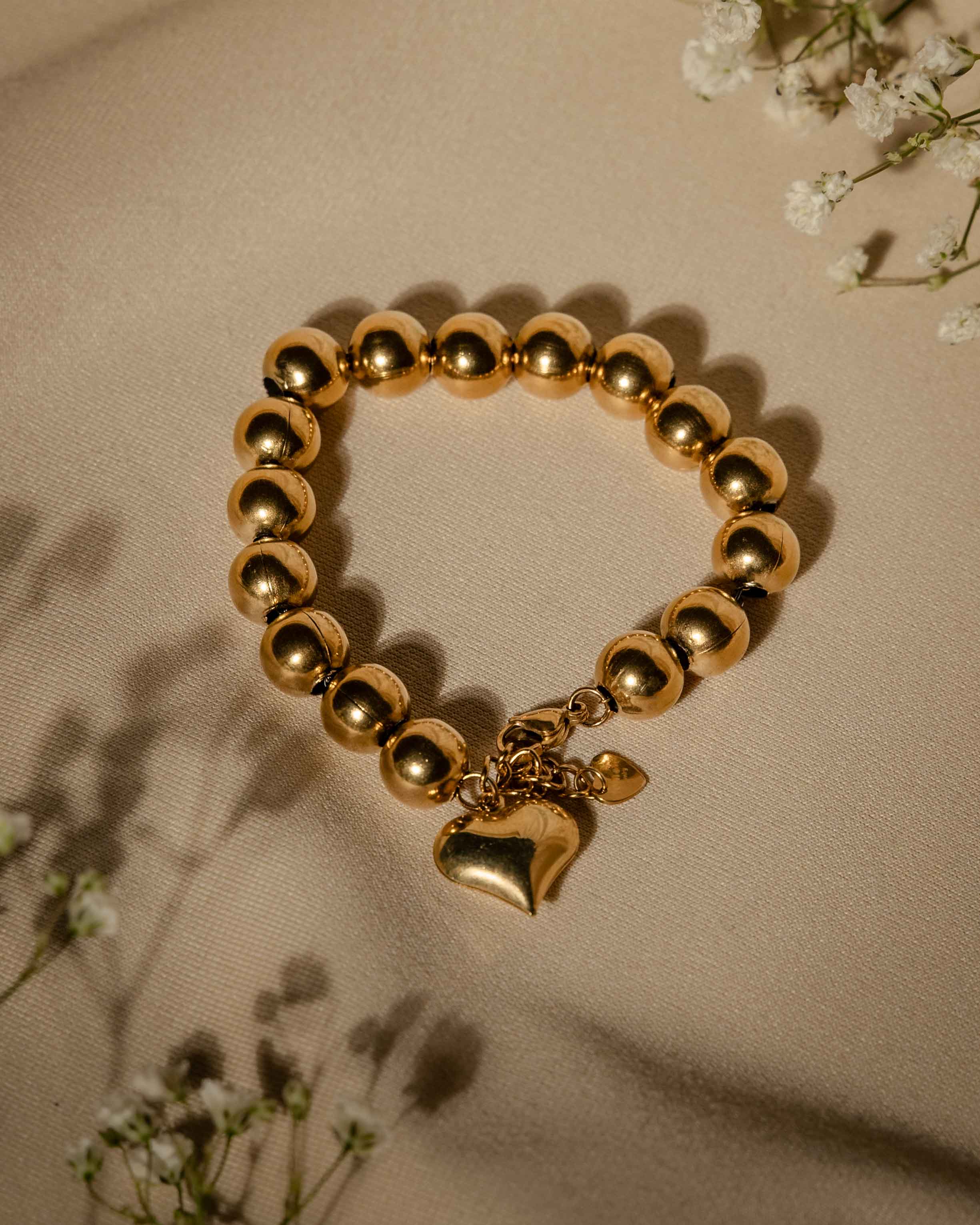 BRACCIALE SONAGLIO LORY CON CUORE ORO IN ACCIAIO DIAM.10