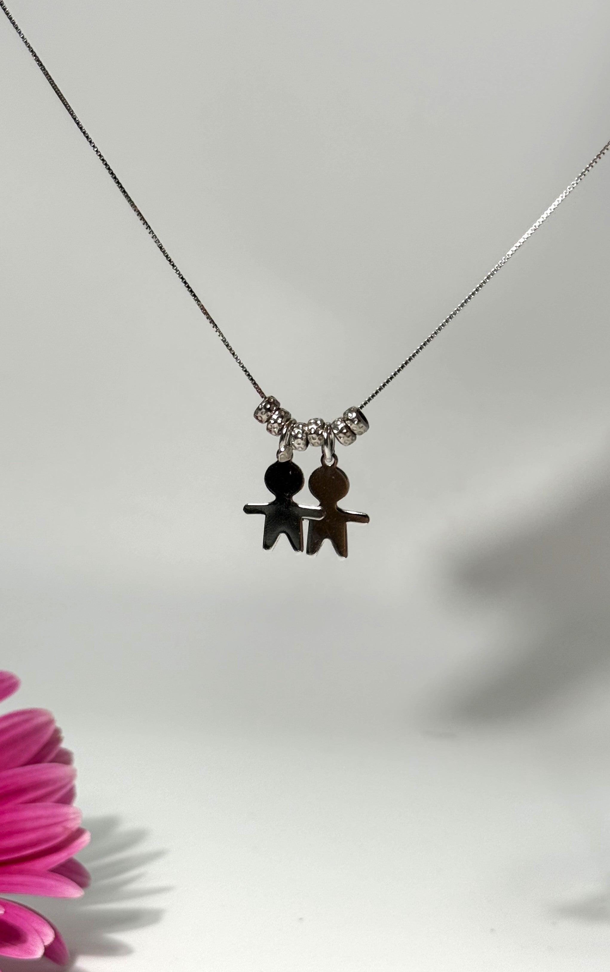 COLLANA CON DUE CIONDOLI BIMBO (1.5CM) IN ARGENTO 925