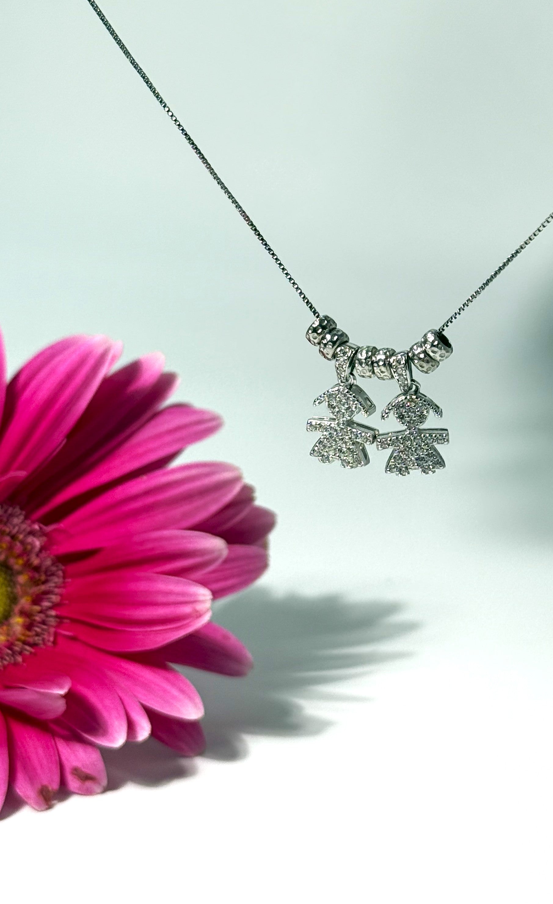 COLLANA CON DUE CIONDOLI BIMBA ZIRCONATO (1.5CM) IN ARGENTO 925