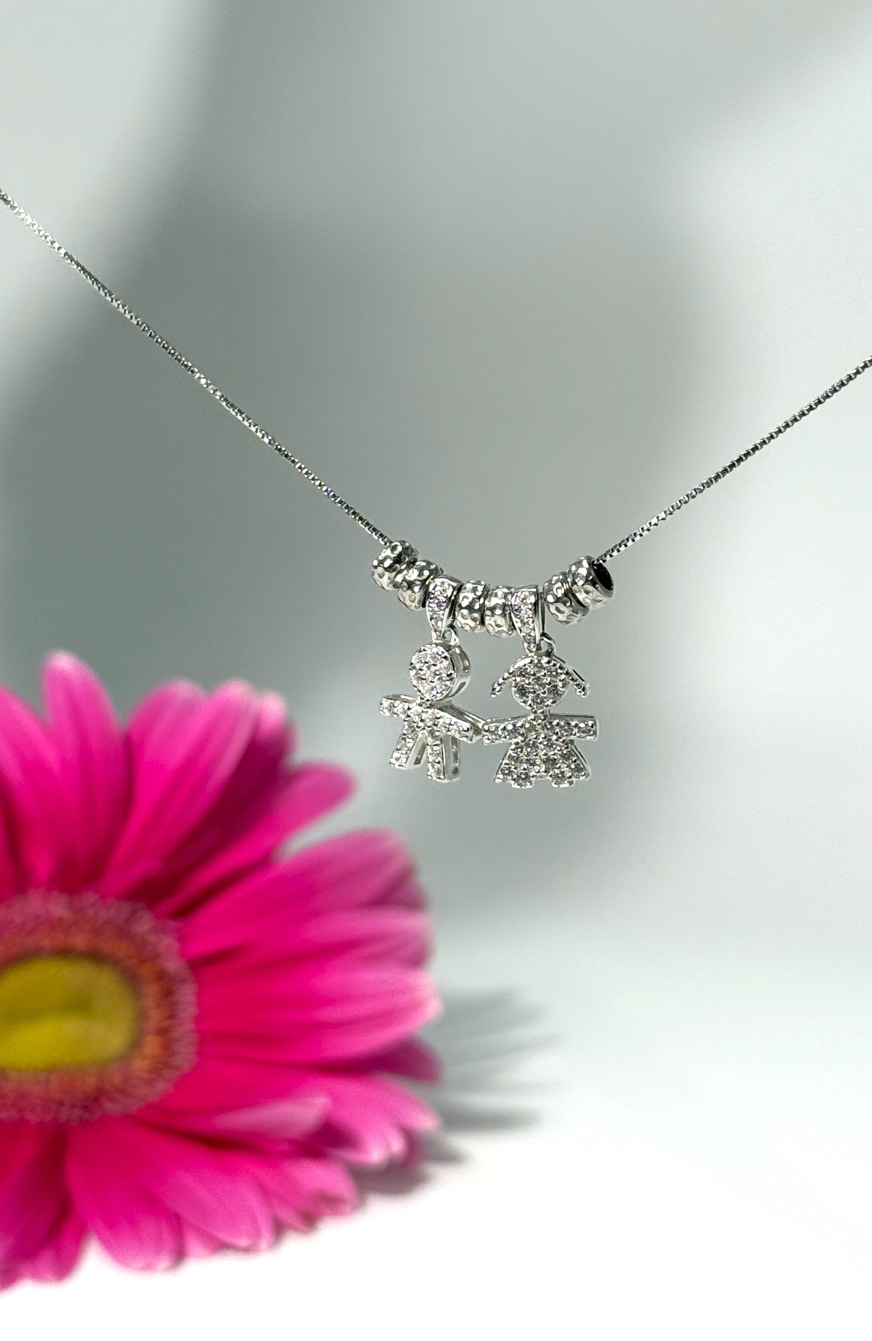 COLLANA CON DUE CIONDOLI,1 BIMBA 1 BIMBO ZIRCONATO (1.5CM) IN ARGENTO 925