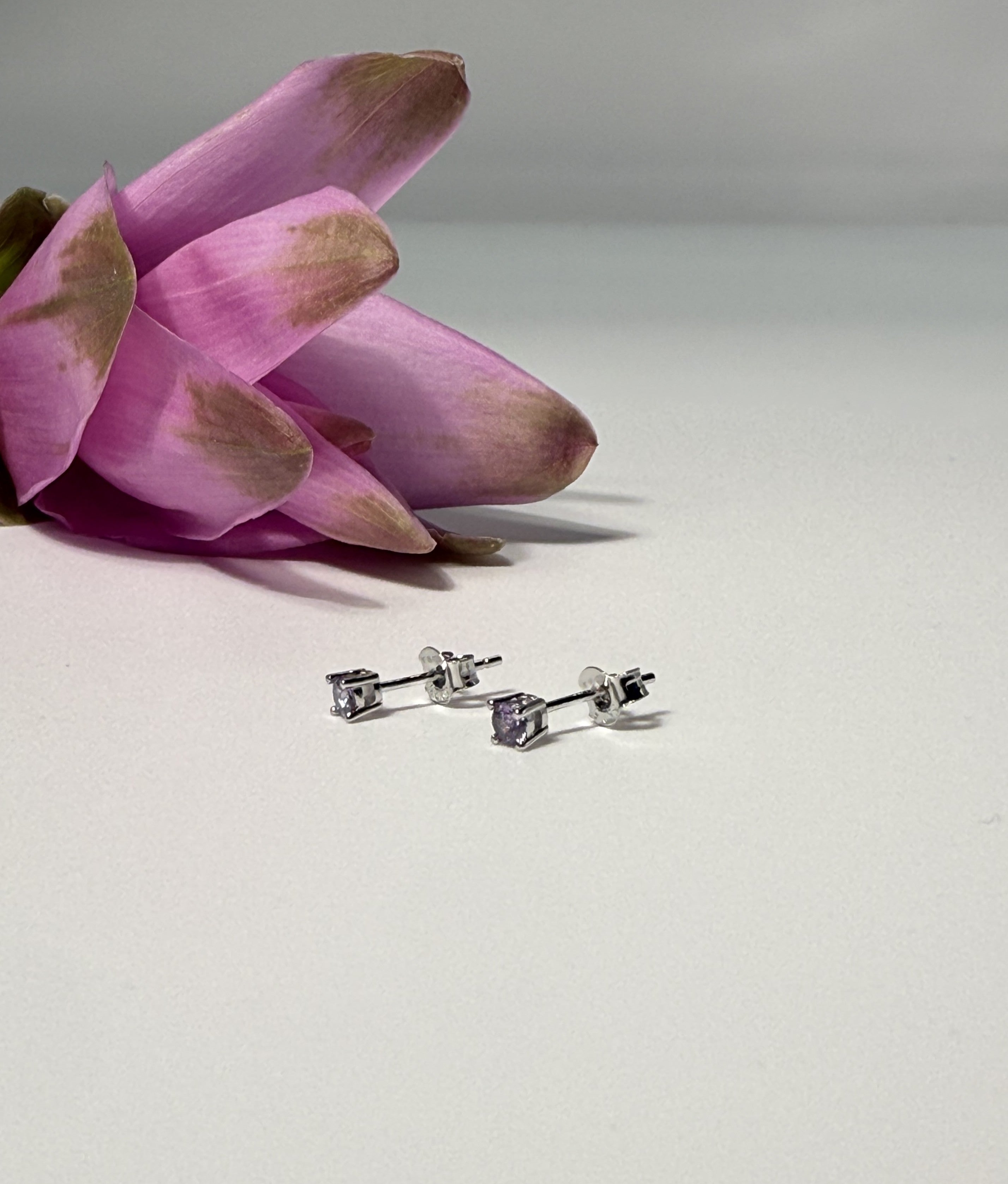 ORECCHINO PUNTO LUCE ZIRCONE VIOLA ARGENTO 925